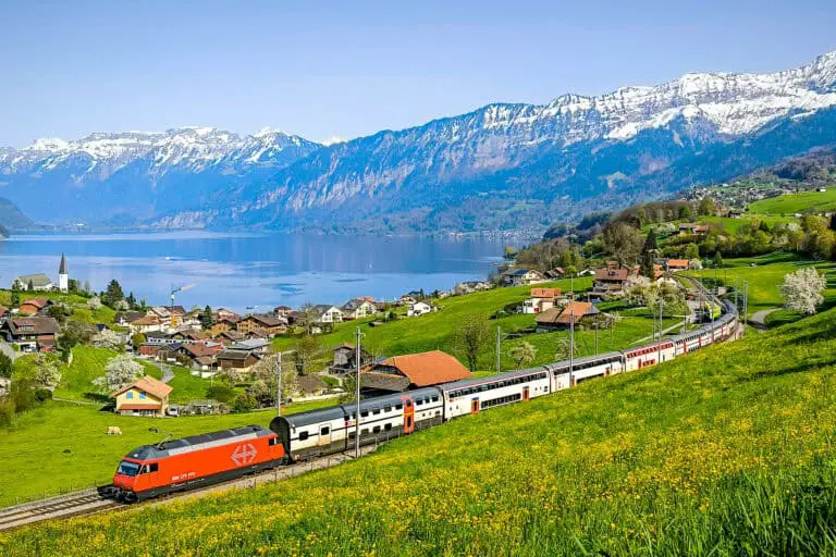 SBB train passing Faulensee on Lake Thun.