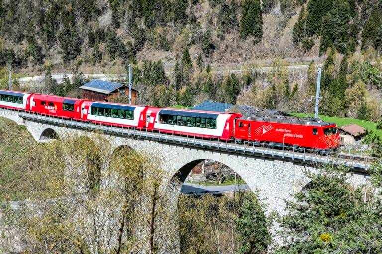 The Glacier Express train on a viaduct near Grengiols,