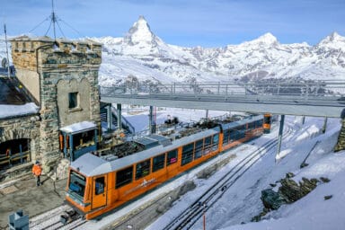 A cogwheel train from Zermatt arriving at the top station of Gornergrat.