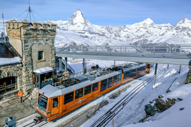 A cogwheel train from Zermatt arriving at the top station of Gornergrat.