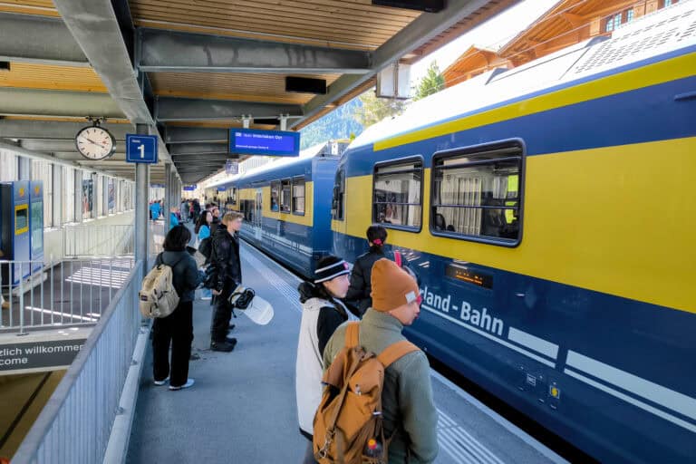A train to Interlaken at the Grindelwald Terminal rail platform.