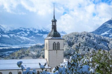 View of the church and hills of Gruyères, seen from the castle site.