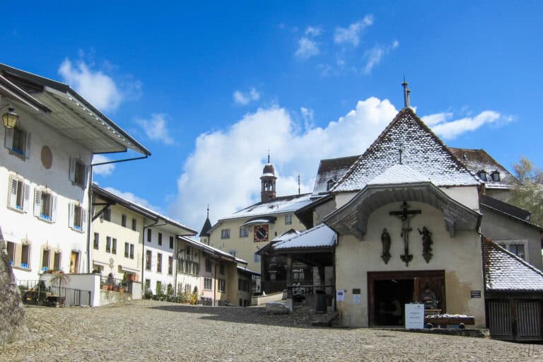 The Gruyères market square with its small church.