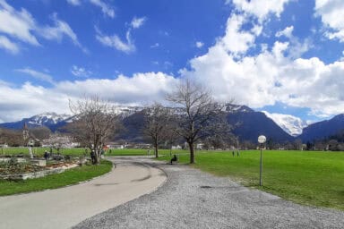 The Höhematte Park with paved walking paths in Interlaken in late March.