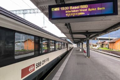 Train to Basel at Interlaken Ost, with a display showing where on the platform 2nd and 1st class coaches can be found.