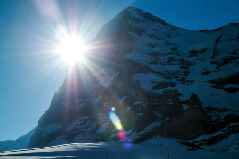 Morning sun rising behind the Eiger at Kleine Scheidegg