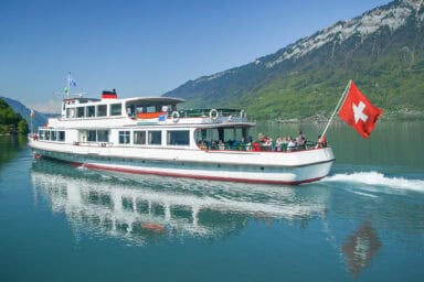 A motorboat at Lake Brienz approaching Iseltwald.