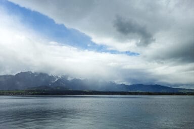 Dramatic sky over Lake Thun, seen from a ship.