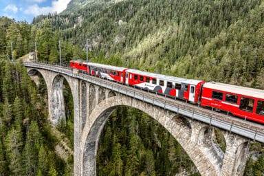 One of the Viaduct Shuttle trains crossing the Landwasser Viaduct.