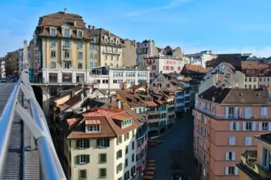 Bridge and colorful house facades in Lausanne old town