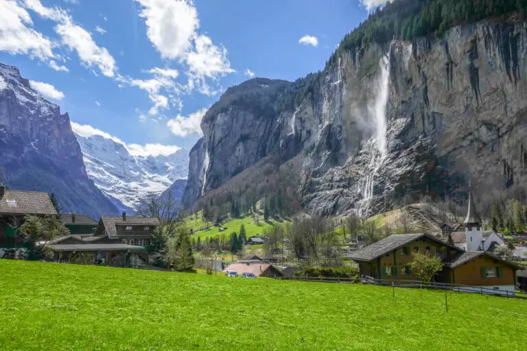 The Lauterbrunnen Valley, its waterfalls, and the village of Lauterbrunnen seen from the train to Wengen.