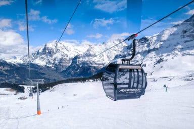 The Männlichen gondolas and the Wetterhorn in early April.