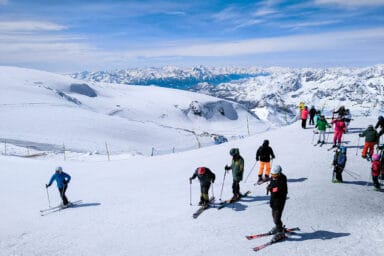 Skiers at the start of the challenging runs of Matterhorn Glacier Paradise.