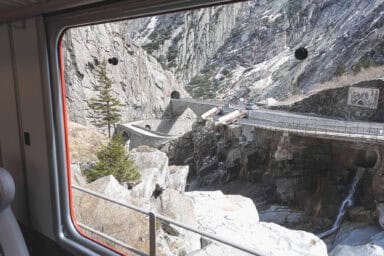 View at the Schöllenen Gorge and the Devil's Bridge from an MGB train between Andermatt and Göschenen.