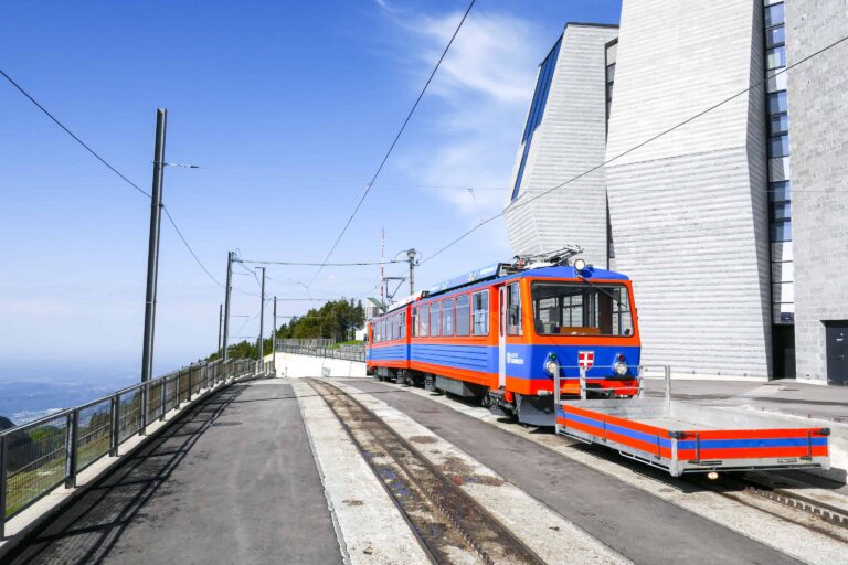 Train and Fiore di Pietra building at Monte Generoso