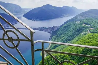 Lake Lugano, green hills and Monte Generoso seen from Monte San Salvatore