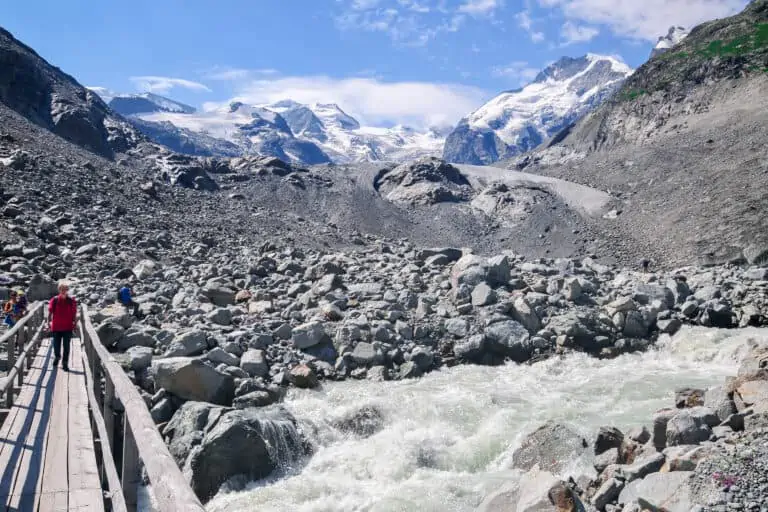 Hiking bridge near melting Morteratsch Glacier in Graubünden