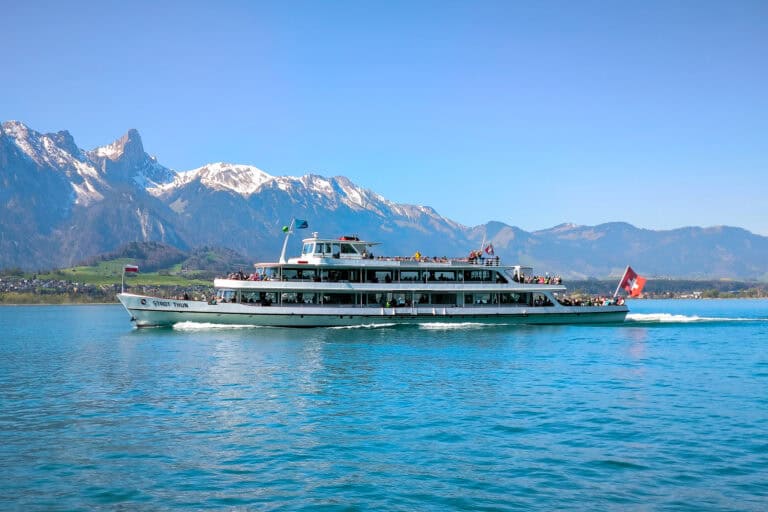 The Stockhorn and a passenger boat on Lake Thun as seen from Oberhofen.
