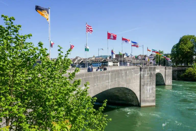 The Rheinbrücke (Rhine Bridge) with flags in Rheinfelden