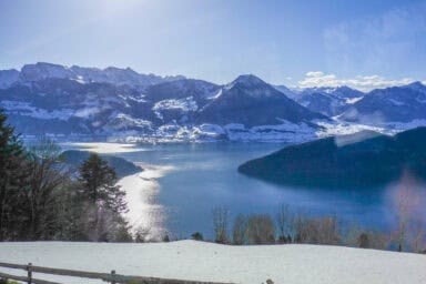 View over a wintry Lake Lucerne from the cogwheel train between Vitznau and Rigi.