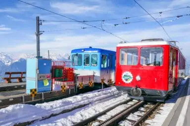 Cogwheel trains in snow at Rigi Kulm