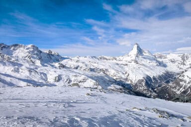 Views of the snow-covered Monte Rosa peaks and the Matterhorn from Rothorn in early April.