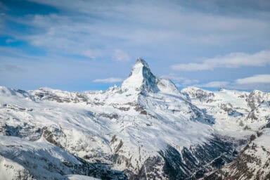 The snowy Matterhorn, seen from the Rothorn peak above Zermatt.