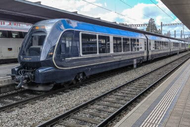 A GoldenPass Express train at the station of Spiez.