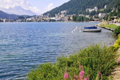 Footpath along St. Moritz lake in summer