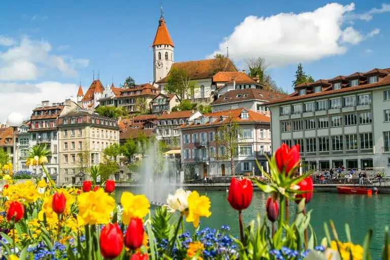 Stadtkirche, Aare, flowers and stately houses in Thun