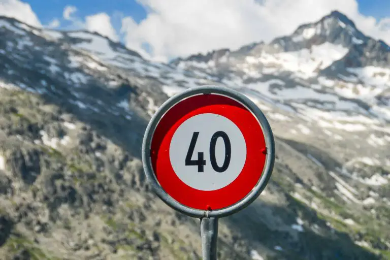 Swiss speed limit traffic sign in the mountains