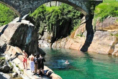 Swimming in the Verzasca river under Ponte dei Salti