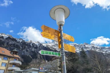 Hiking signposts opposite the Wengen train station.