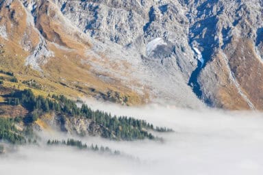 Low clouds at the foot of the Wetterhorn in autumn.