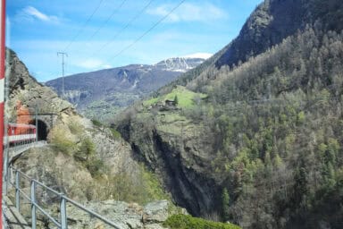 Train entering a tunnel near Stalden in the Matter Valley.