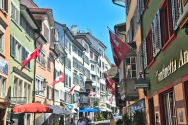 Augustinerstrasse with flags in Zurich